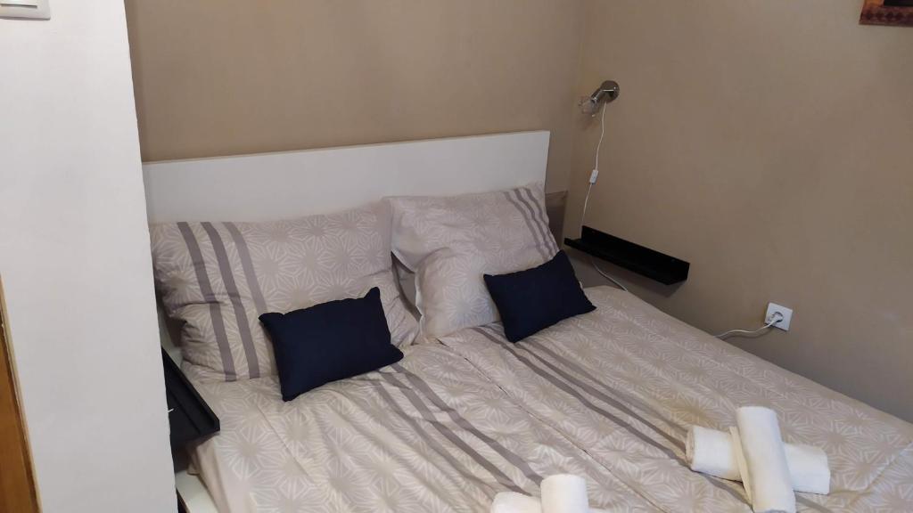 Łóżko lub łóżka w pokoju w obiekcie Arcadia Guesthouse