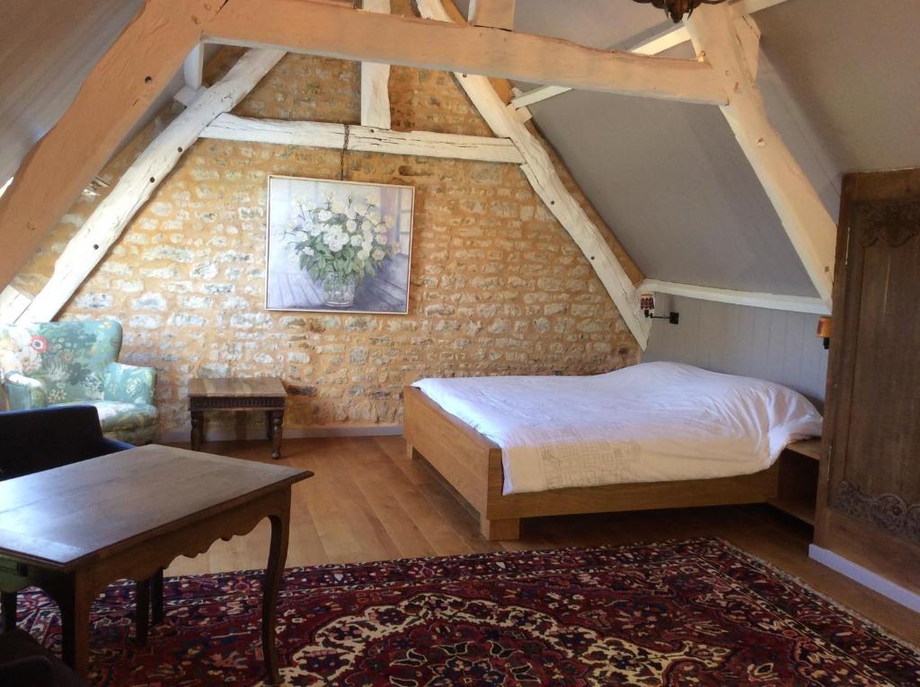 Postel nebo postele na pokoji v ubytování Chambres d'hôtes de charme