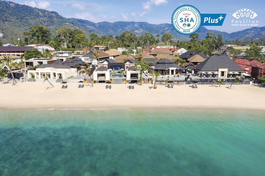 a view of the beach at a resort at Pavilion Samui Villas and Resort - SHA Extra Plus in Lamai
