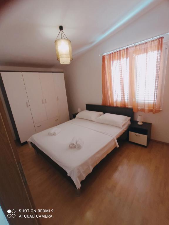 Posteľ alebo postele v izbe v ubytovaní Apartment Bartol with Free Bikes and Great Local Food