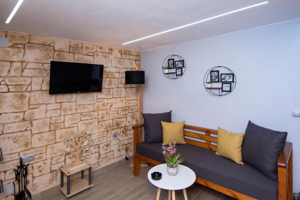 TV a/nebo společenská místnost v ubytování Mini Bella Gonia