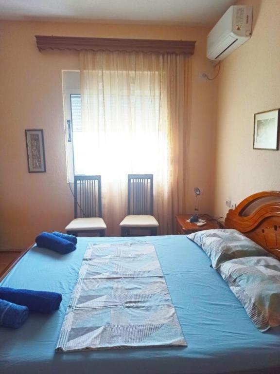 Voodi või voodid majutusasutuse Inn Cloud Gjirokaster toas