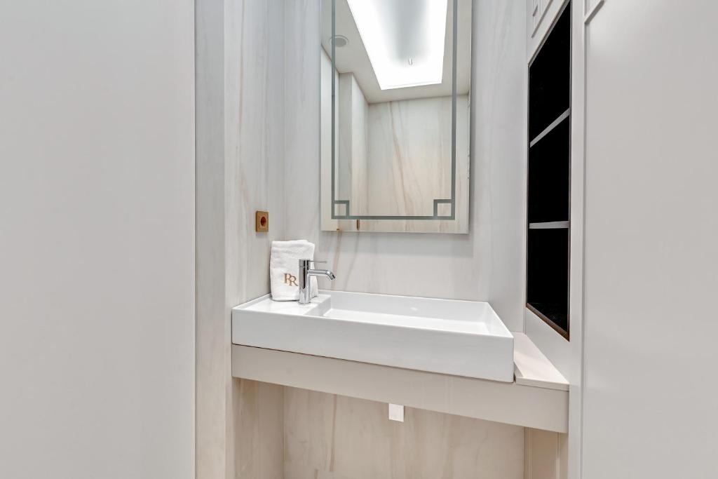 Kúpeľňa v ubytovaní Granaria RR DeLuxe Apartment Old Town