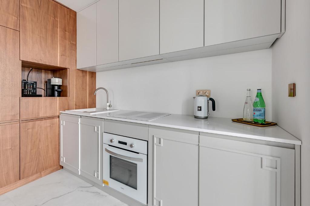 Kuchyňa alebo kuchynka v ubytovaní Granaria RR DeLuxe Apartment Old Town