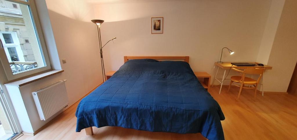 Postel nebo postele na pokoji v ubytování Apartmán 46m2 s balkonem v lázeňském centru