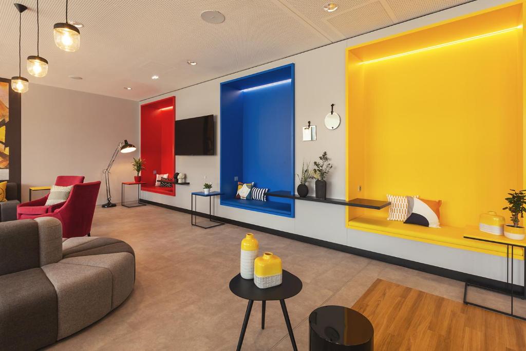 Zona d'estar a Holiday Inn - the niu, Form Stuttgart Feuerbach by IHG