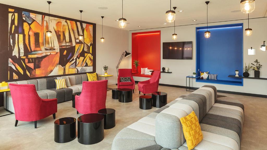 Zona d'estar a Holiday Inn - the niu, Form Stuttgart Feuerbach by IHG