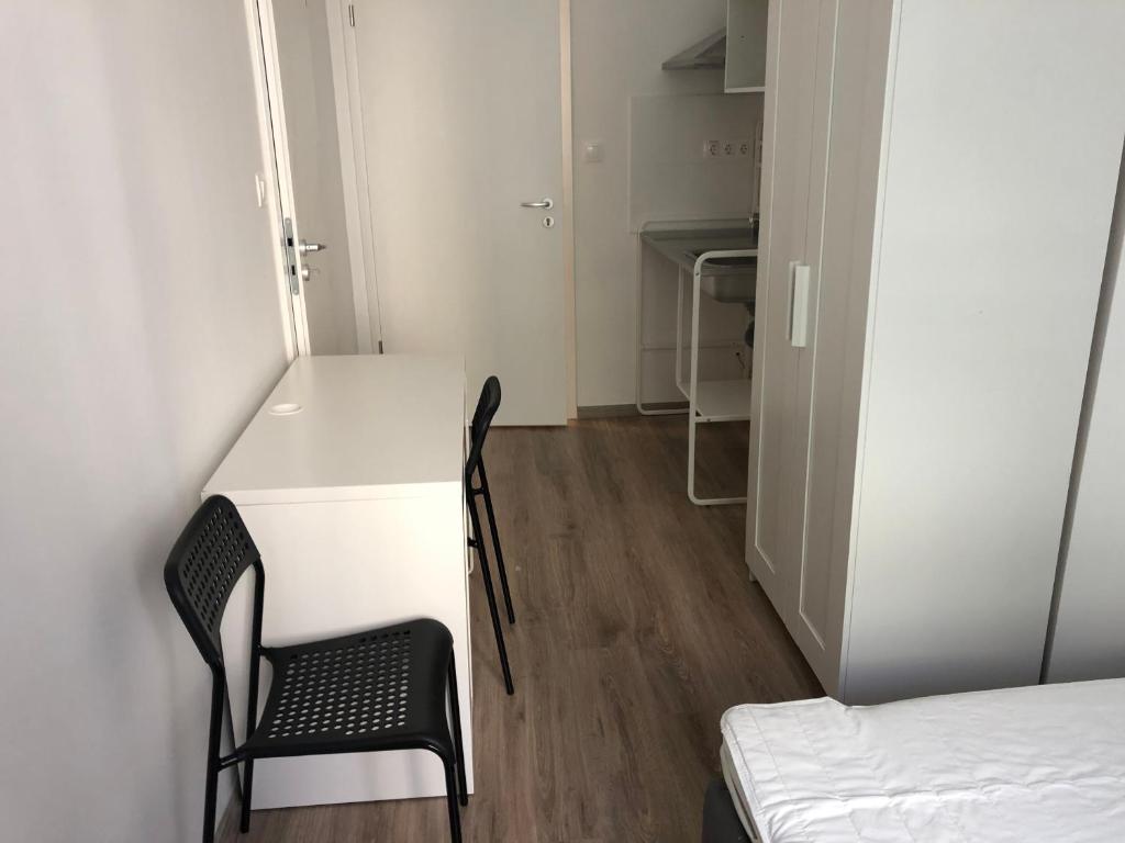Postel nebo postele na pokoji v ubytování Omega Apartments Budapest
