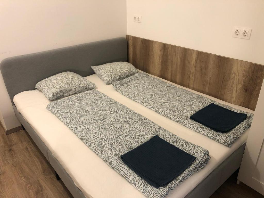 Postel nebo postele na pokoji v ubytování Omega Apartments Budapest