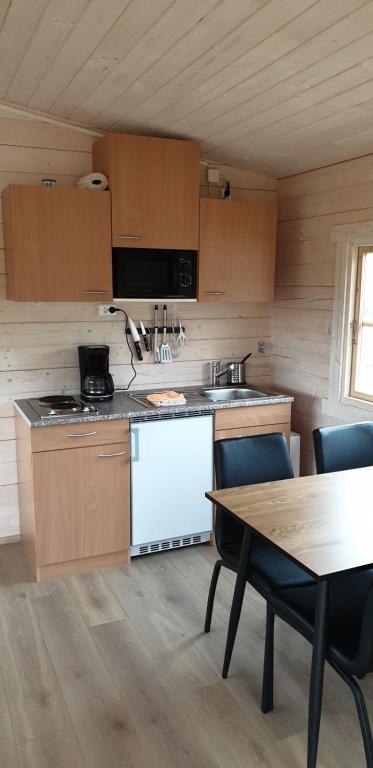 Kuchyň nebo kuchyňský kout v ubytování Hvammur 5 with private hot tub