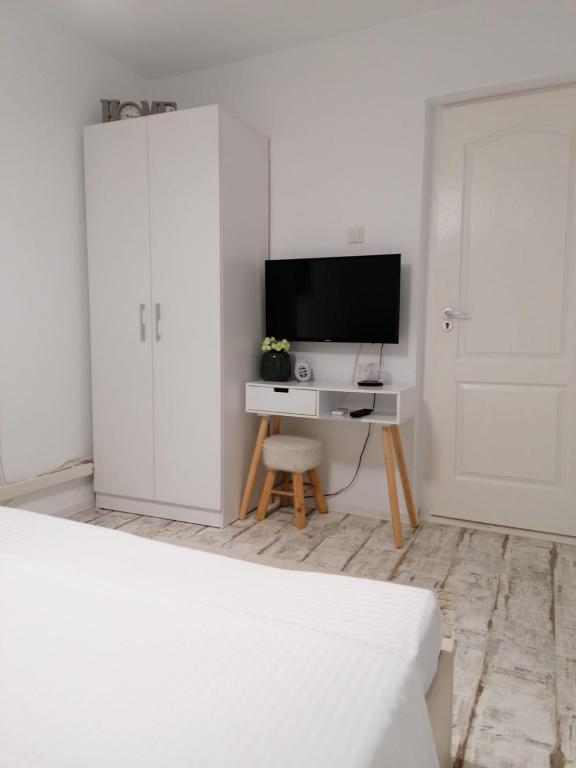TV a/nebo společenská místnost v ubytování Alexandra House