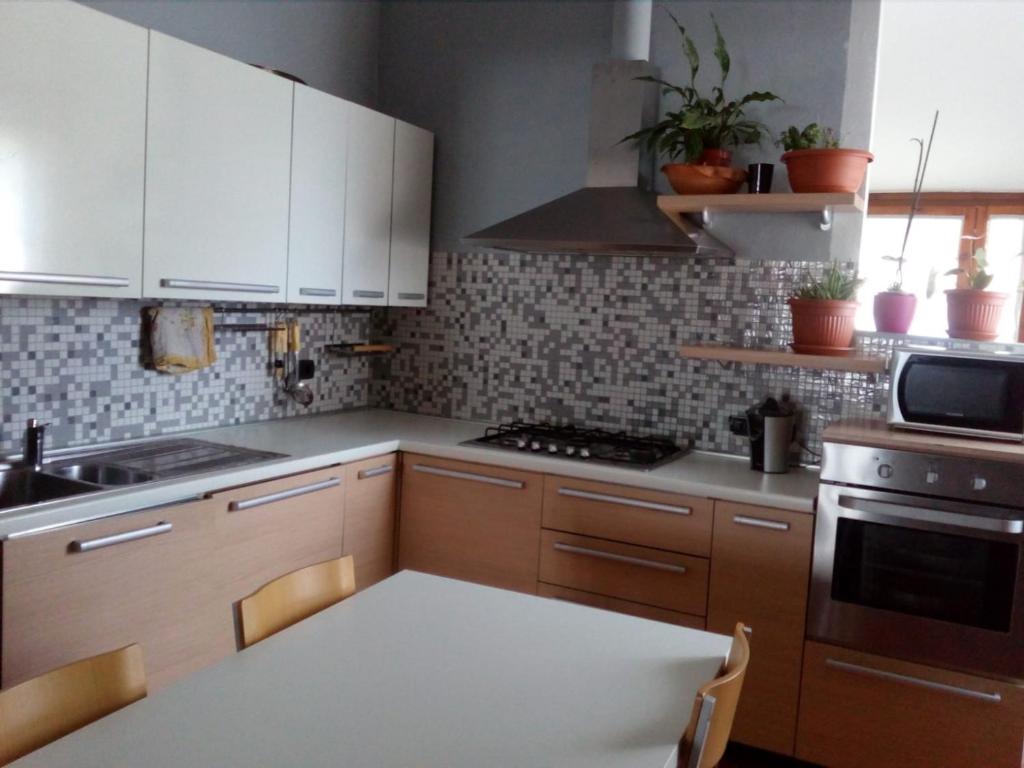 Kuchyň nebo kuchyňský kout v ubytování B&B La Forcella