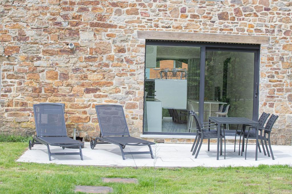 Patio nebo venkovní prostory v ubytování Le Moulin de Bosson - Belina