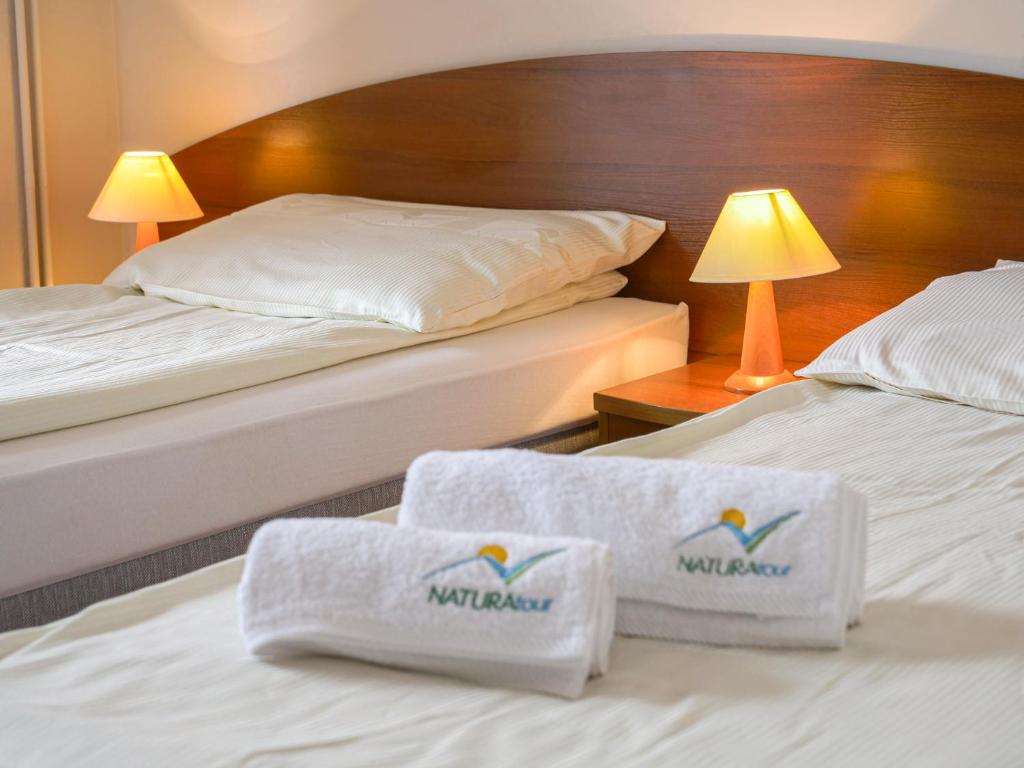 Postel nebo postele na pokoji v ubytování Meduza Natura Tour