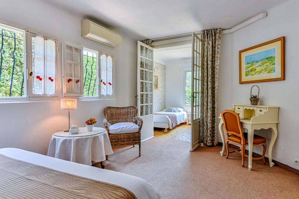 Postel nebo postele na pokoji v ubytování Hotel Mas Djoliba