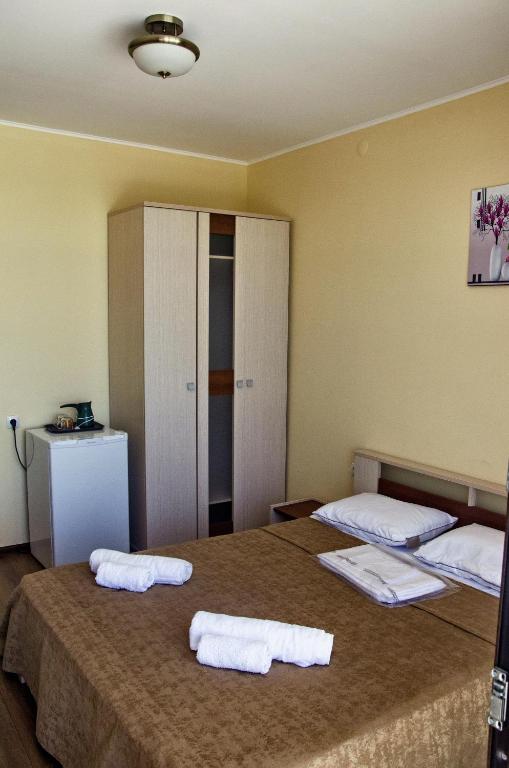 Postel nebo postele na pokoji v ubytování Hotel Medusa