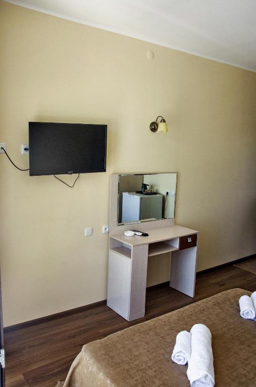 TV a/nebo společenská místnost v ubytování Hotel Medusa