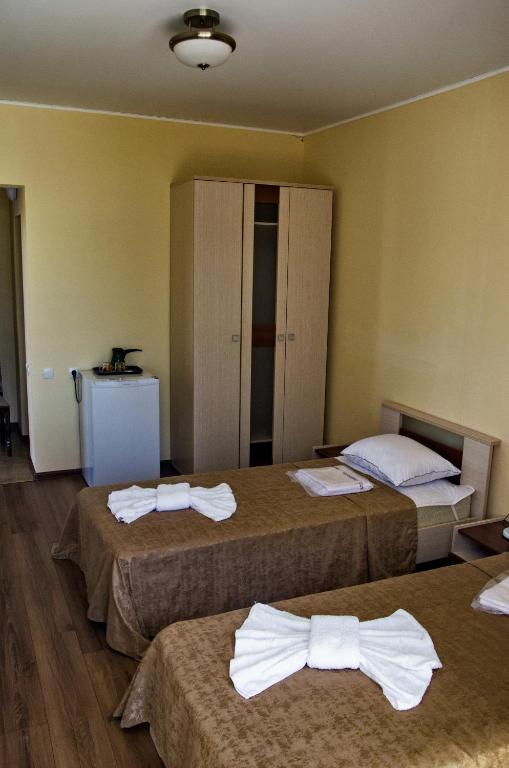 Postel nebo postele na pokoji v ubytování Hotel Medusa