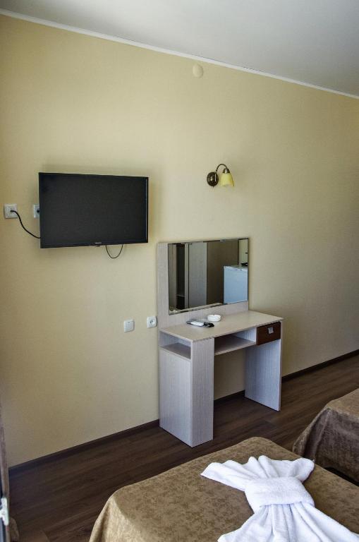 TV a/nebo společenská místnost v ubytování Hotel Medusa