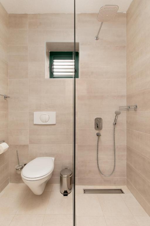 Koupelna v ubytování Apartments Jovan