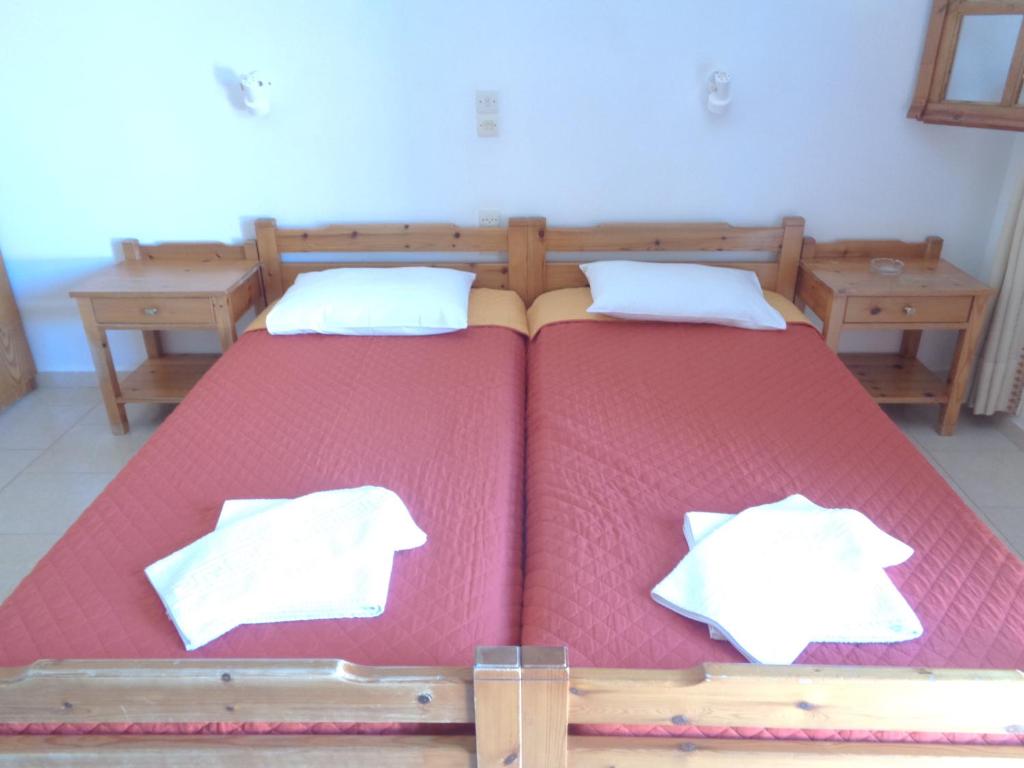 Postel nebo postele na pokoji v ubytování LITHI