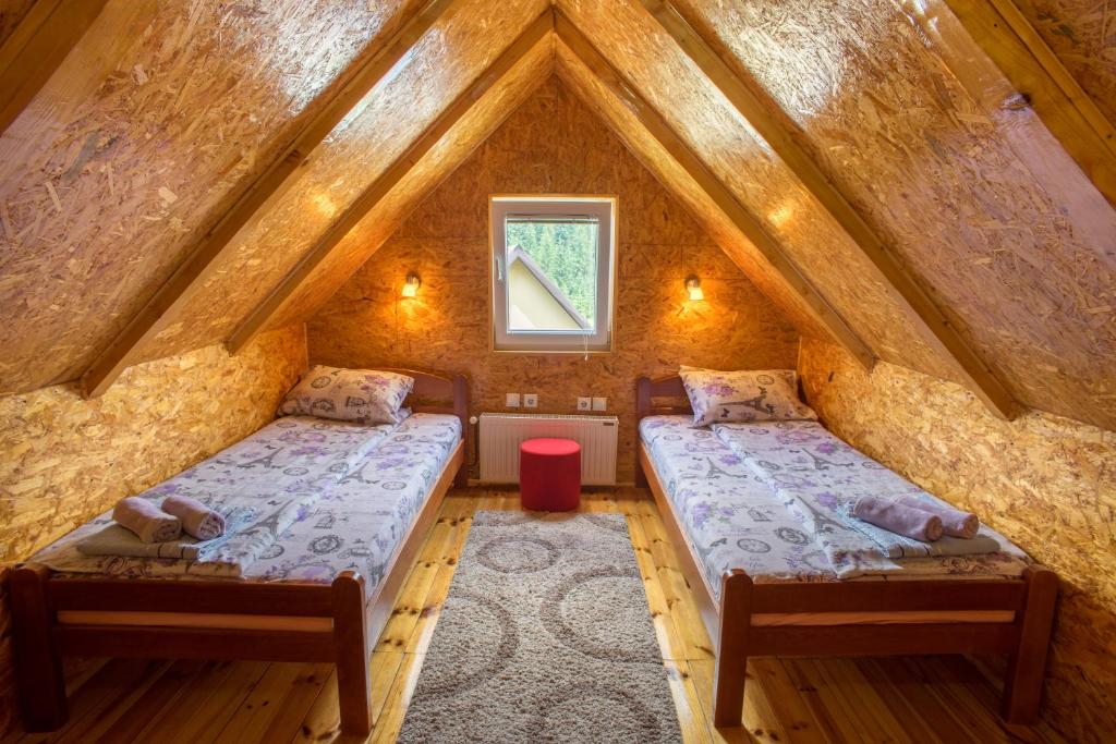 Postel nebo postele na pokoji v ubytování Apartments Dedeic