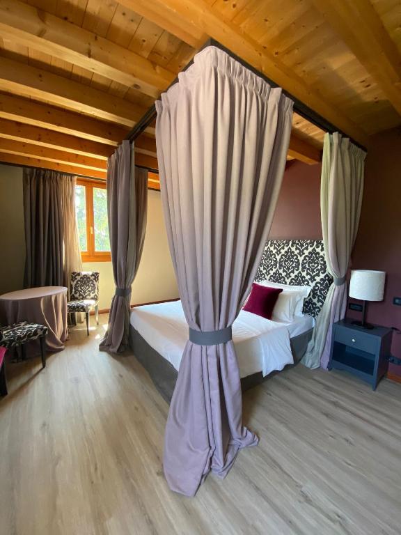 Postel nebo postele na pokoji v ubytování Boutique Hotel Municipio 1815