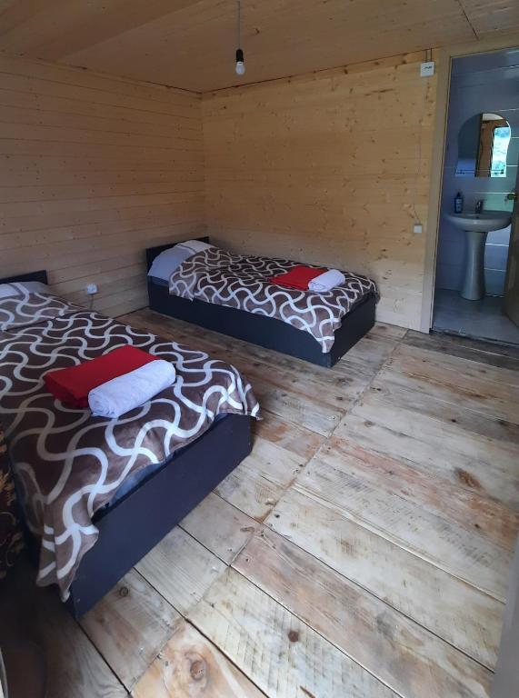 Postel nebo postele na pokoji v ubytování Guesthouse Pirimze