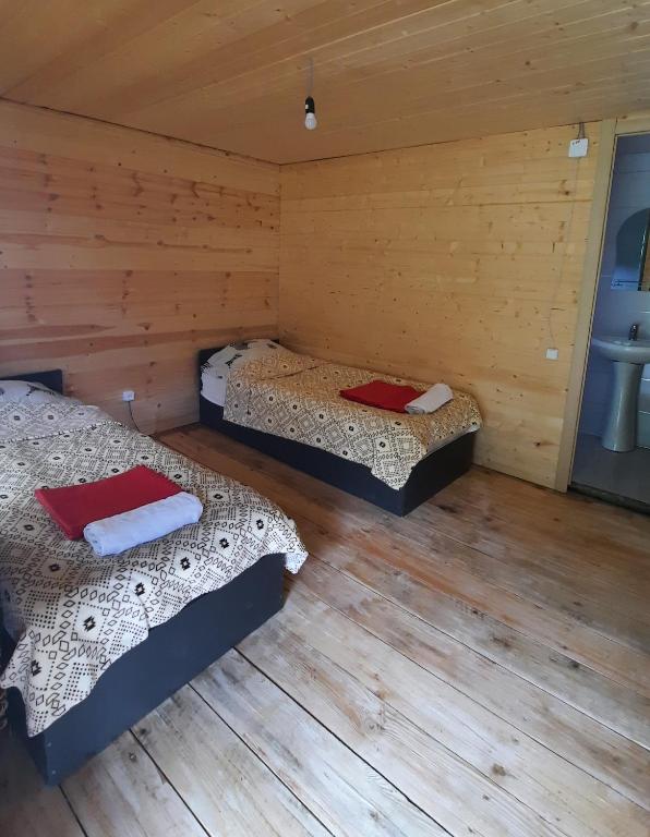 Postel nebo postele na pokoji v ubytování Guesthouse Pirimze