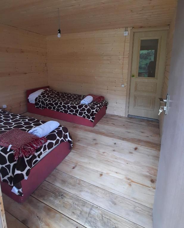 Postel nebo postele na pokoji v ubytování Guesthouse Pirimze