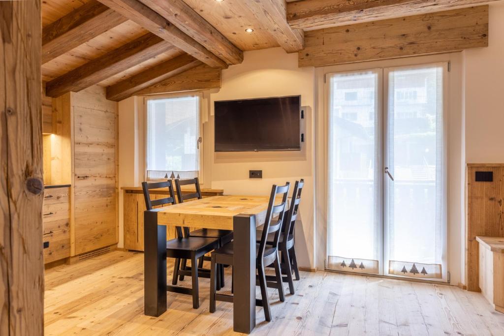 TV a/nebo společenská místnost v ubytování Lino Deluxe Suite