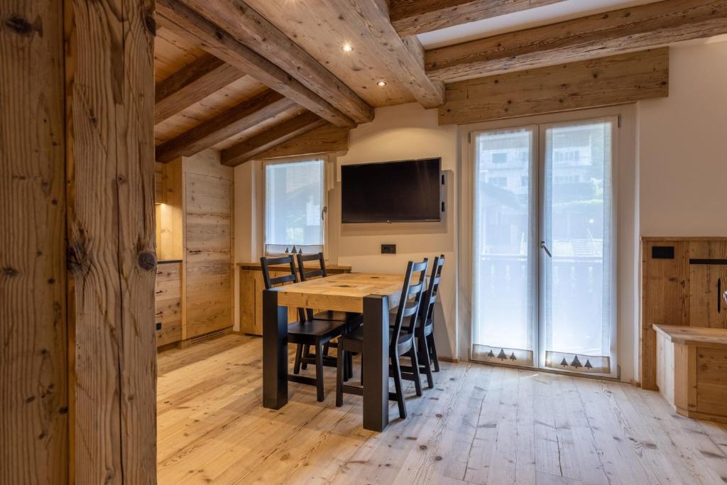 TV a/nebo společenská místnost v ubytování Lino Deluxe Suite