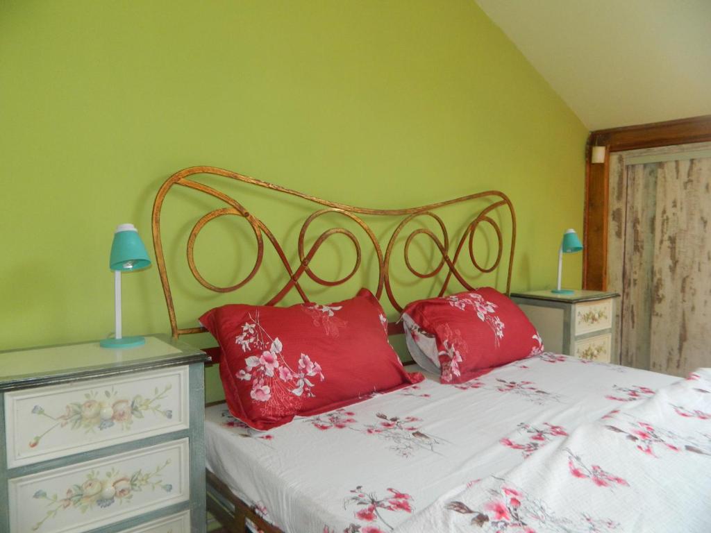 Postel nebo postele na pokoji v ubytování Casa Ligia