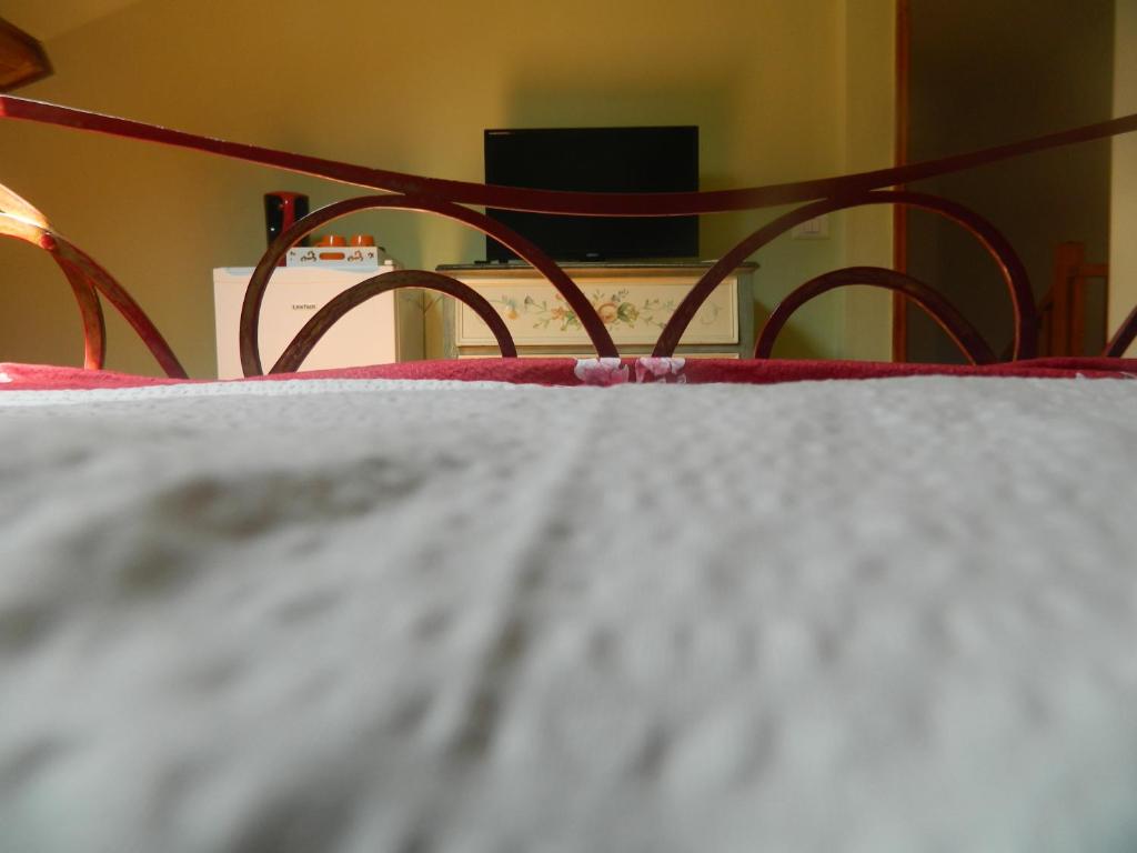 Postel nebo postele na pokoji v ubytování Casa Ligia