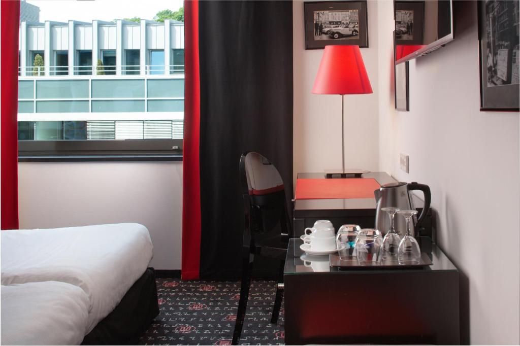 Postel nebo postele na pokoji v ubytování OREA Hotel Angelo Praha