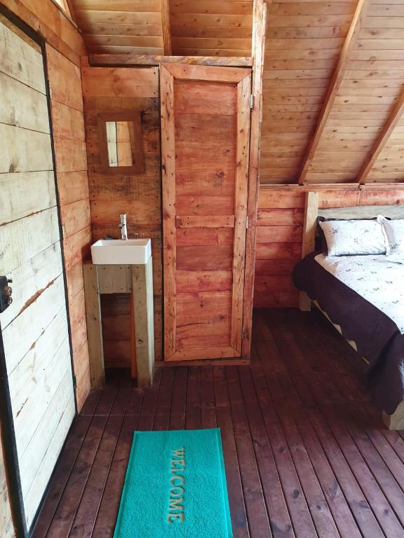 Postel nebo postele na pokoji v ubytování Glamping Rionegro- arrayanes