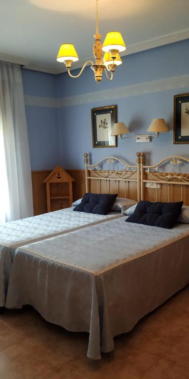 Postel nebo postele na pokoji v ubytování Hosteria Gante