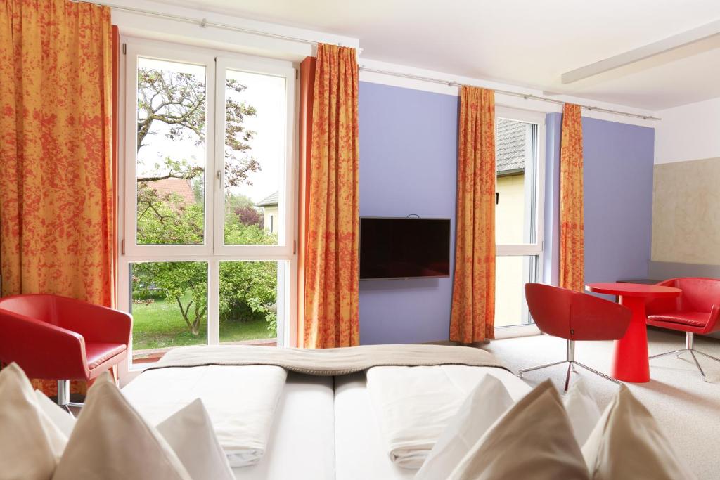 TV a/nebo společenská místnost v ubytování Hotel Maxlhaid