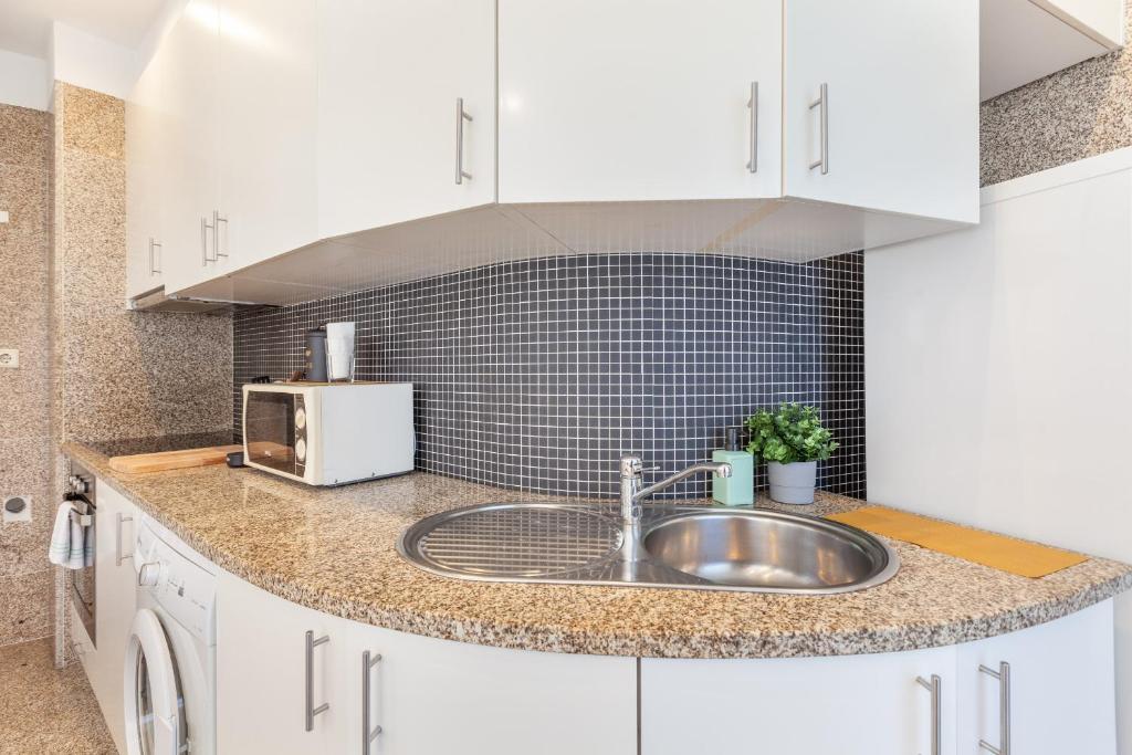 Kuchyň nebo kuchyňský kout v ubytování D&S - Ribeira Premium Apartments