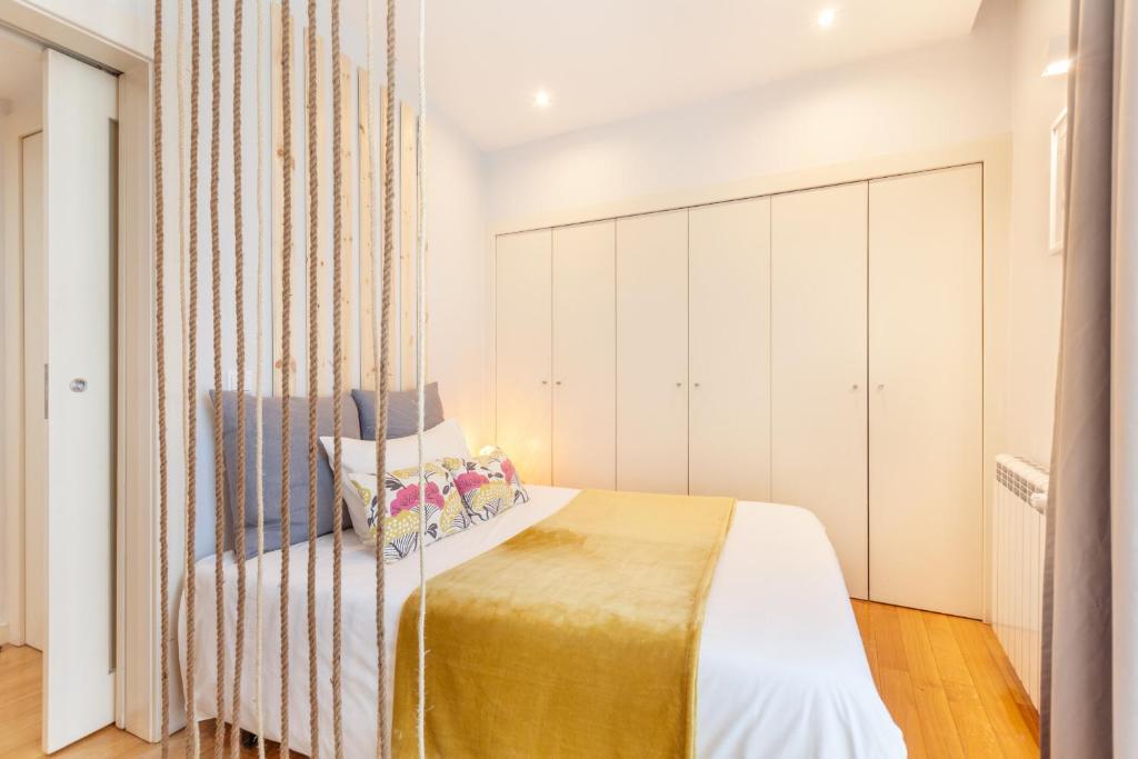 Postel nebo postele na pokoji v ubytování D&S - Ribeira Premium Apartments