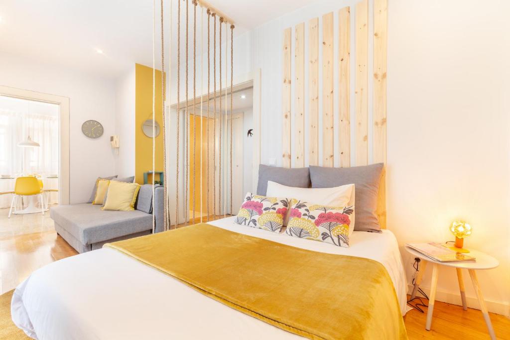 Postel nebo postele na pokoji v ubytování D&S - Ribeira Premium Apartments
