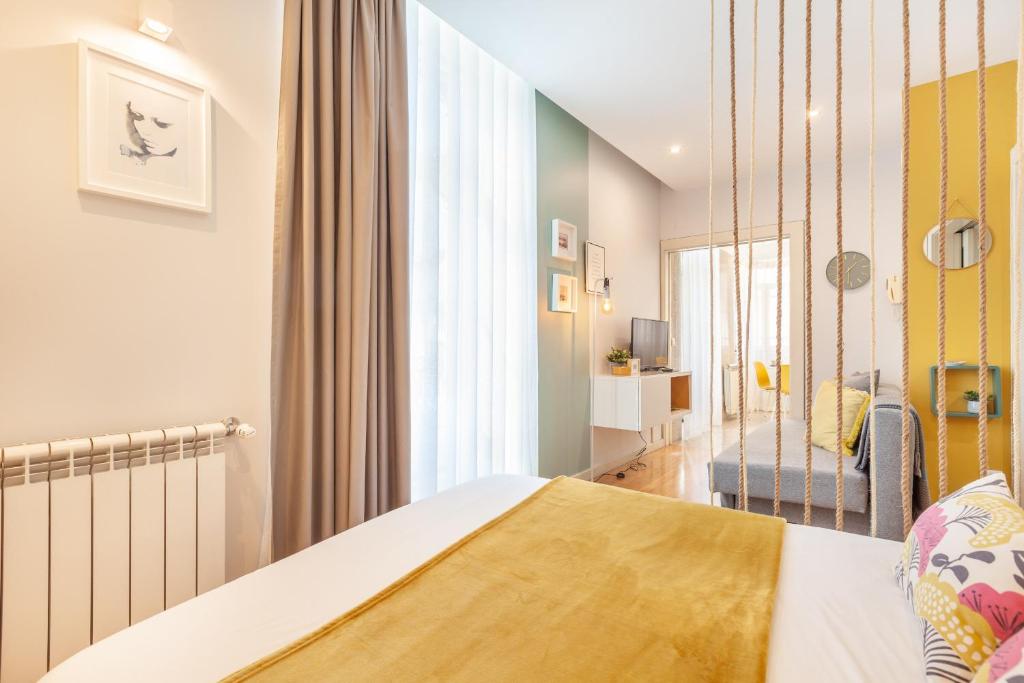 Postel nebo postele na pokoji v ubytování D&S - Ribeira Premium Apartments