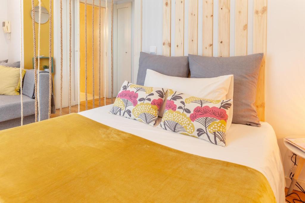Postel nebo postele na pokoji v ubytování D&S - Ribeira Premium Apartments