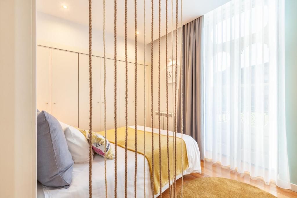 Postel nebo postele na pokoji v ubytování D&S - Ribeira Premium Apartments