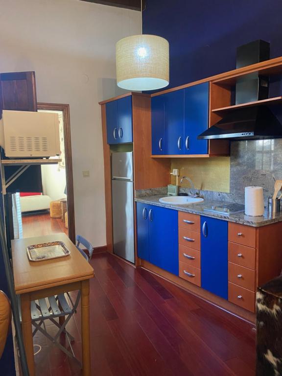 A kitchen or kitchenette at Apartamento con zona chill-out y preciosas vistas