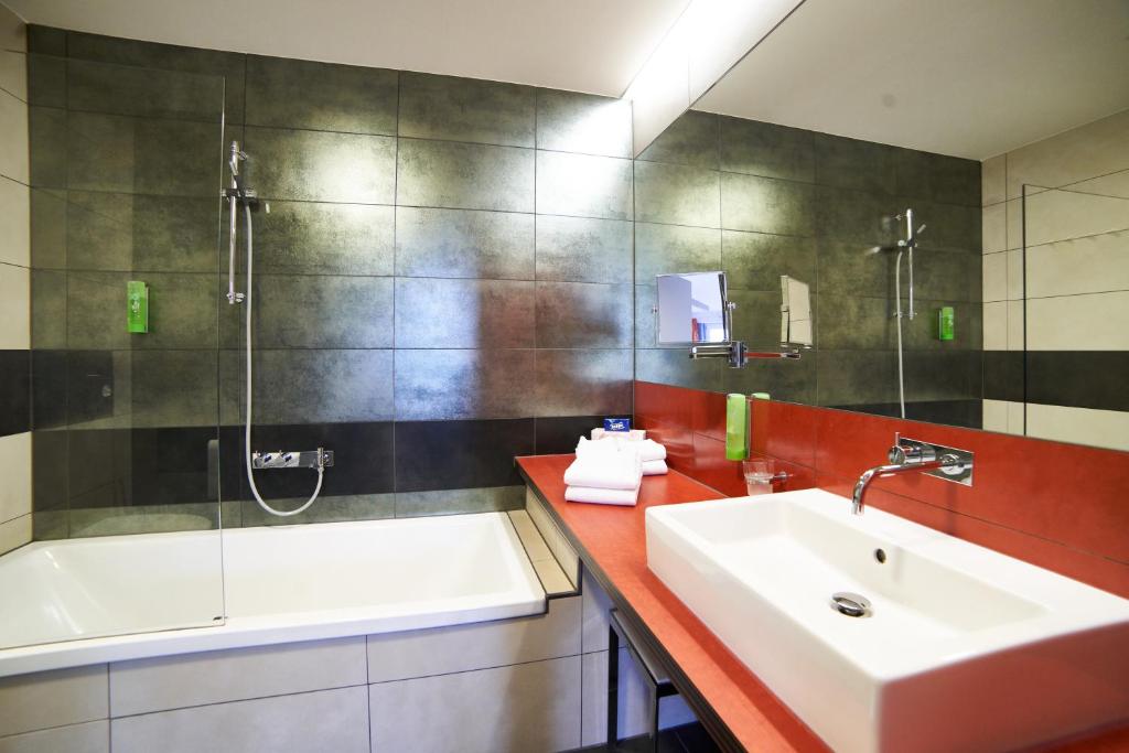 Koupelna v ubytování Hotel Maxlhaid