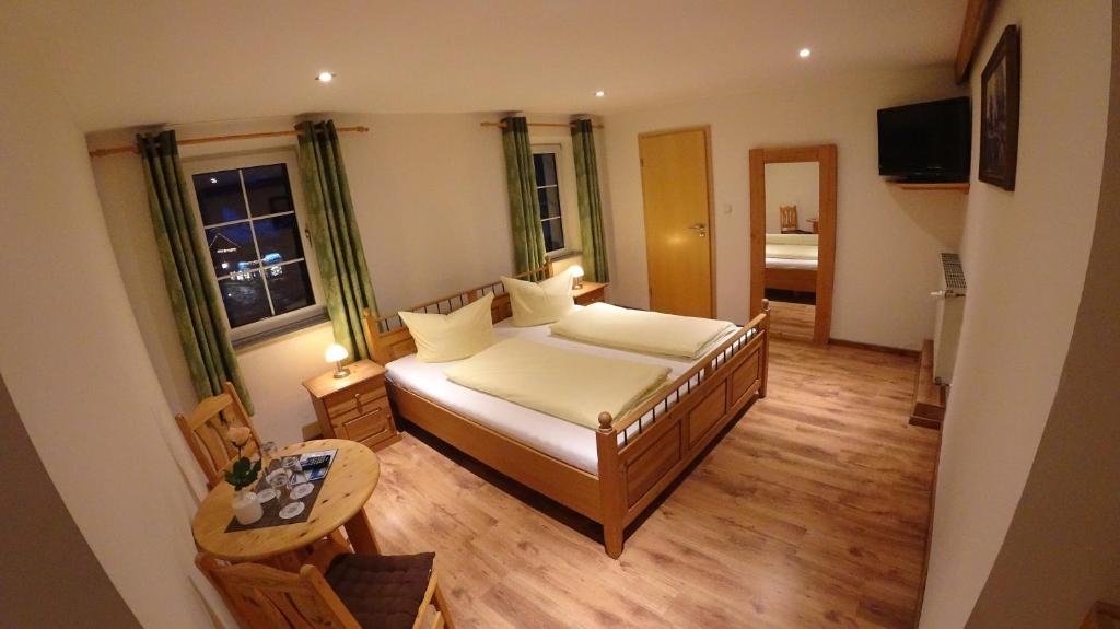 Voodi või voodid majutusasutuse Hotel Almrausch toas