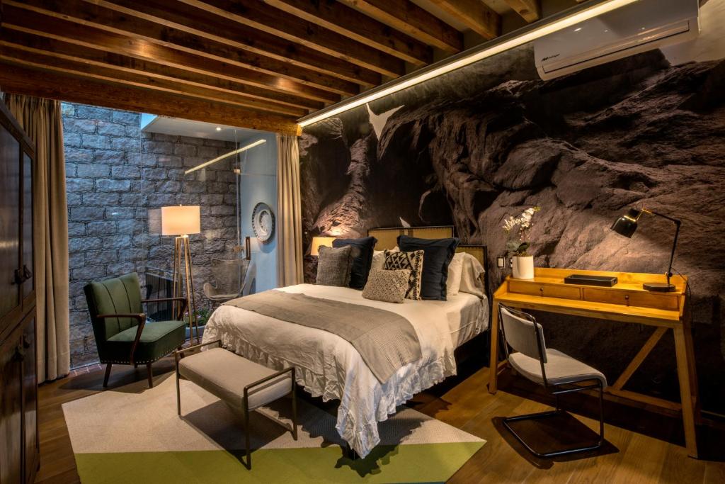 Postel nebo postele na pokoji v ubytování Casa Cien Hilos
