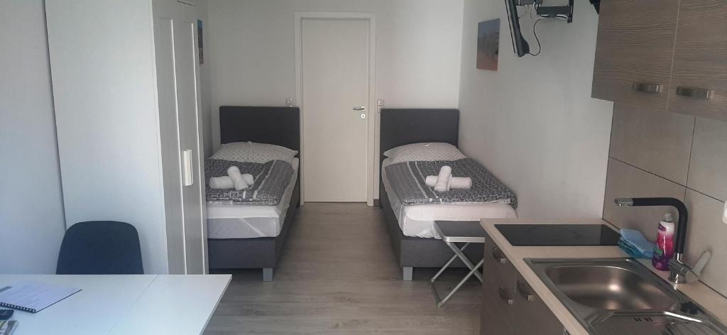 Rúm í herbergi á Ferienwohnung Wittenberge