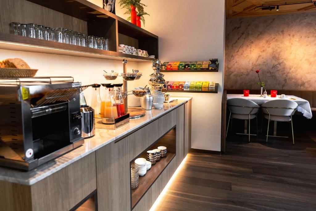 Kuchyň nebo kuchyňský kout v ubytování Hotel Garni Günther